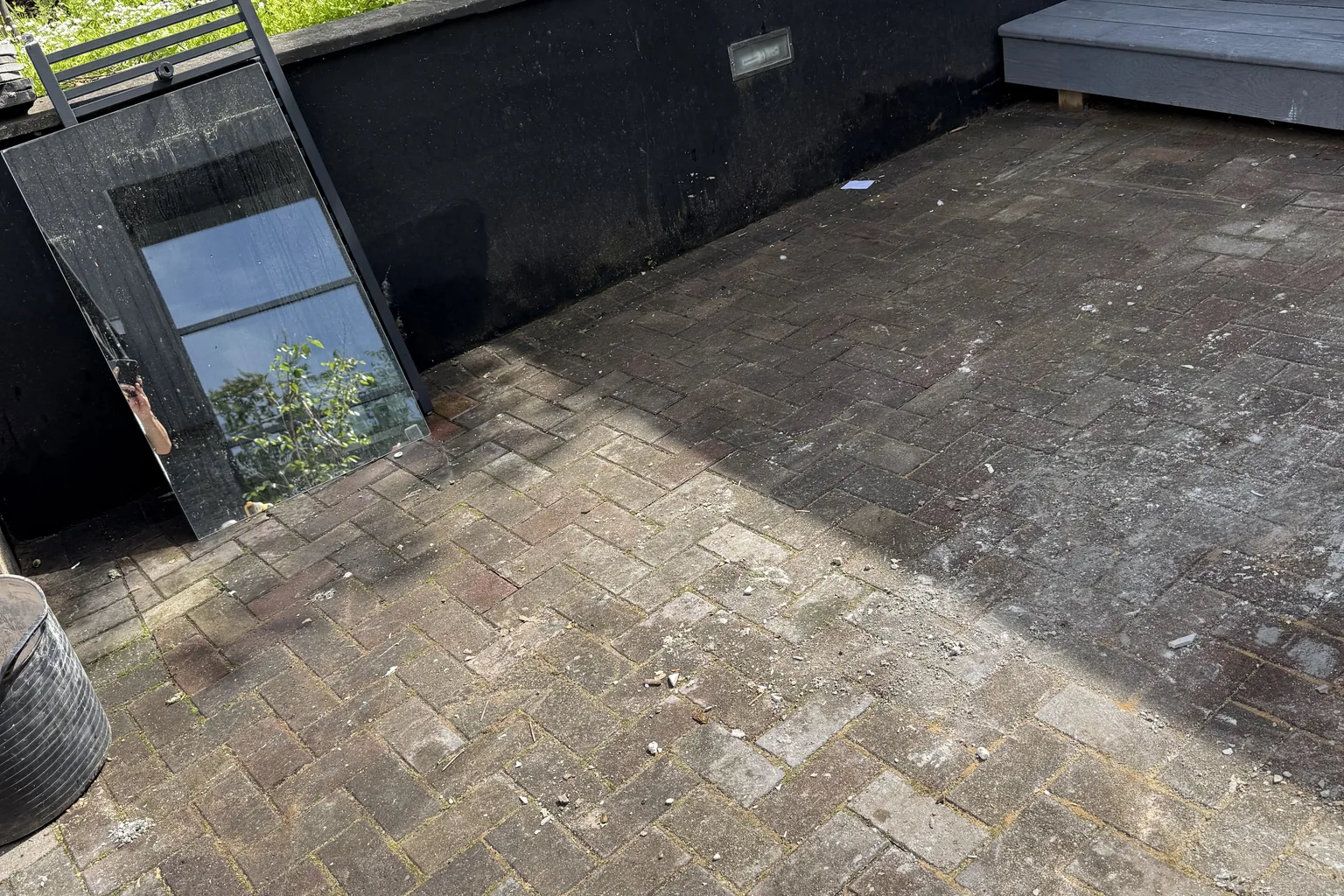 Patio paving before exterior cleaning.
